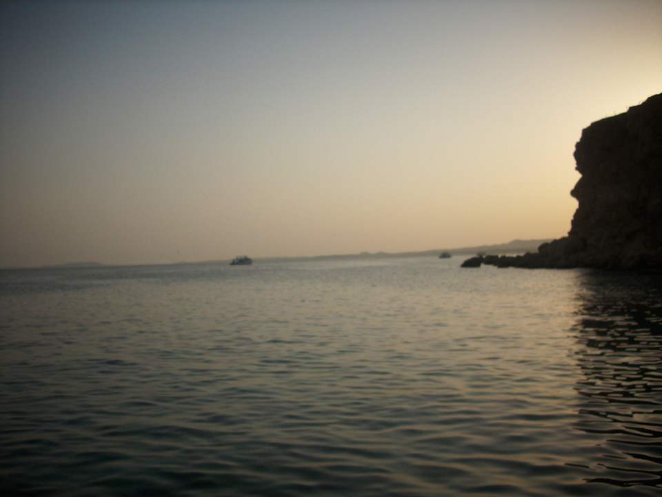 Zachód  słońca, pomost Hotel El Faraana Reef Resort