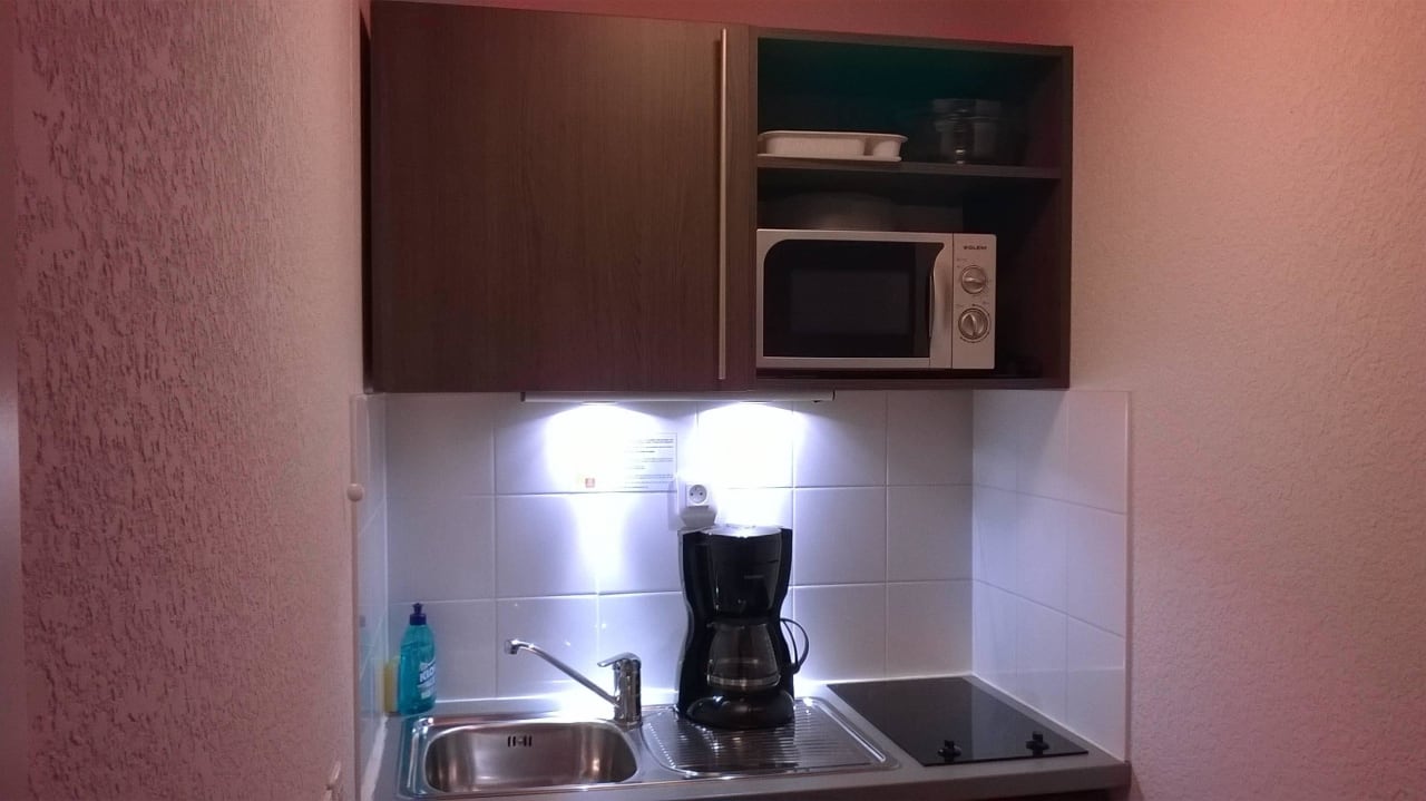 Мини-кухня в номере  Hotel Adagio Access Strassbourg Petite France