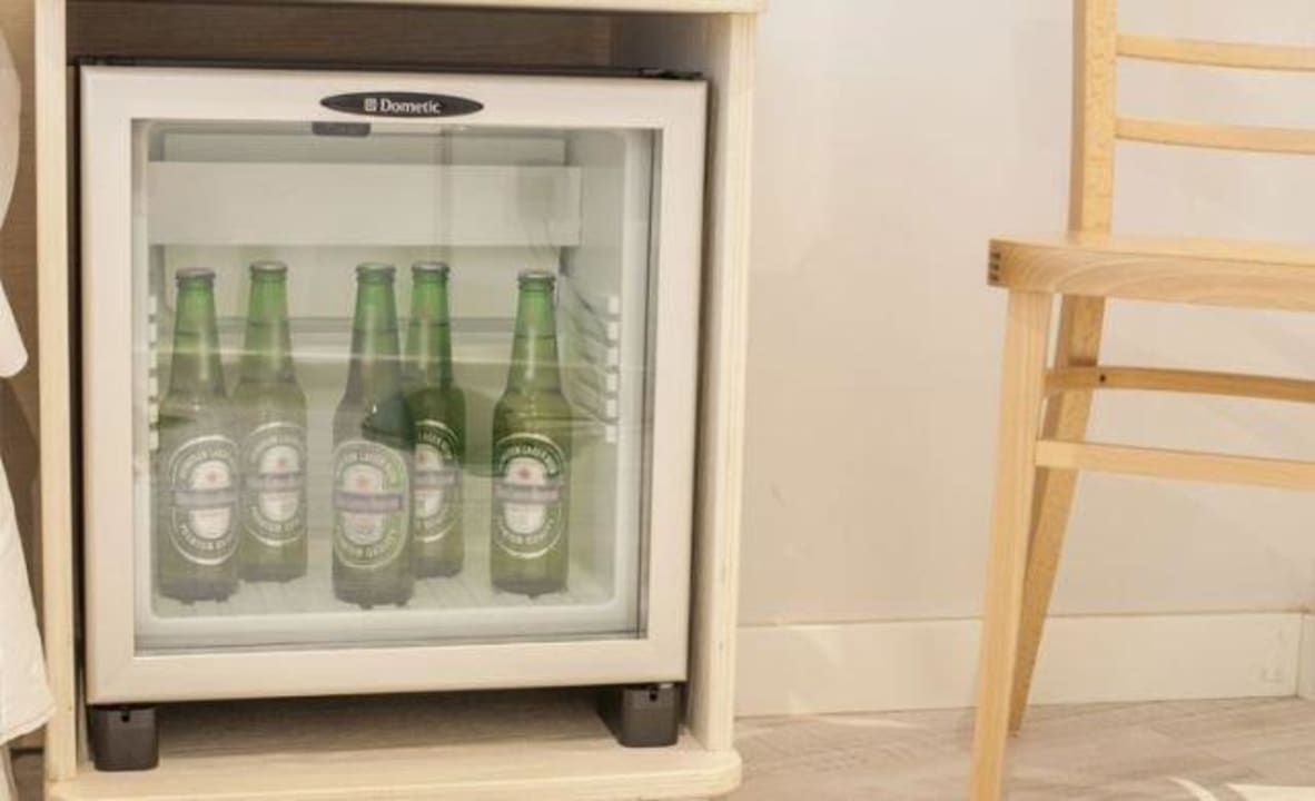 Minibar en la habitación  Lotelito Rooms & Bar