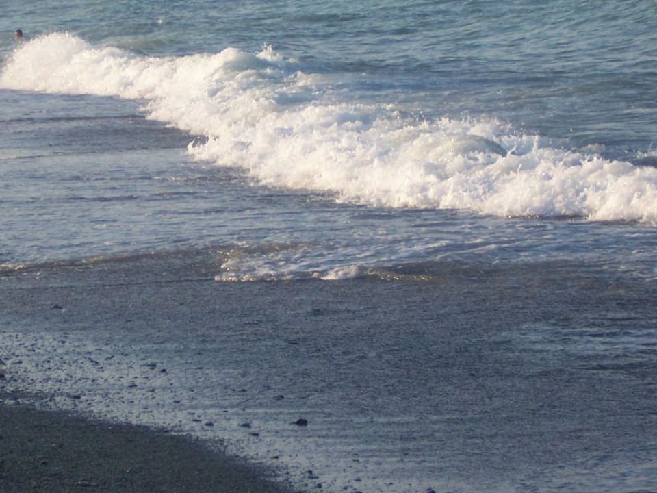 Schöne Wellen am frühen Morgen Olympian Bay Grand Resort