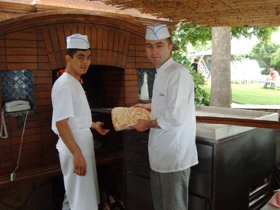 Köche bei der Arbeit Side Star Elegance