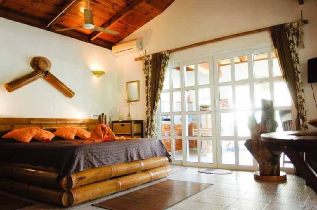 Schlafzimmer Haus & Apartments Beau Bamboo