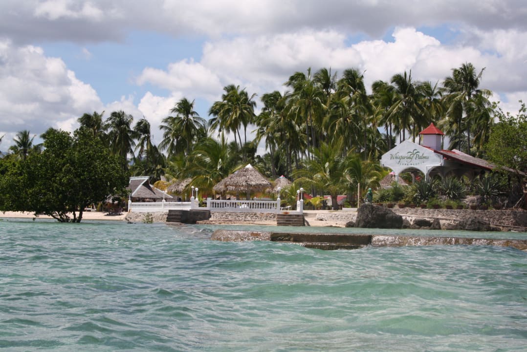 Ansicht vom Wasser her Hotel Whispering Palms Island Resort