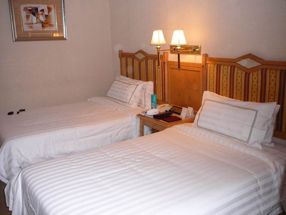 Betten im Zimmer Hotel Majesty Plaza Shanghai