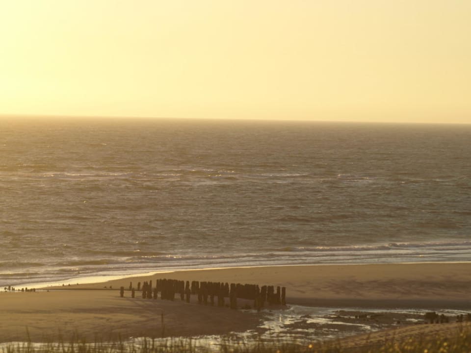 Sonnenuntergang von Treppe zum Strand Dünenhotel Alt-Rantum