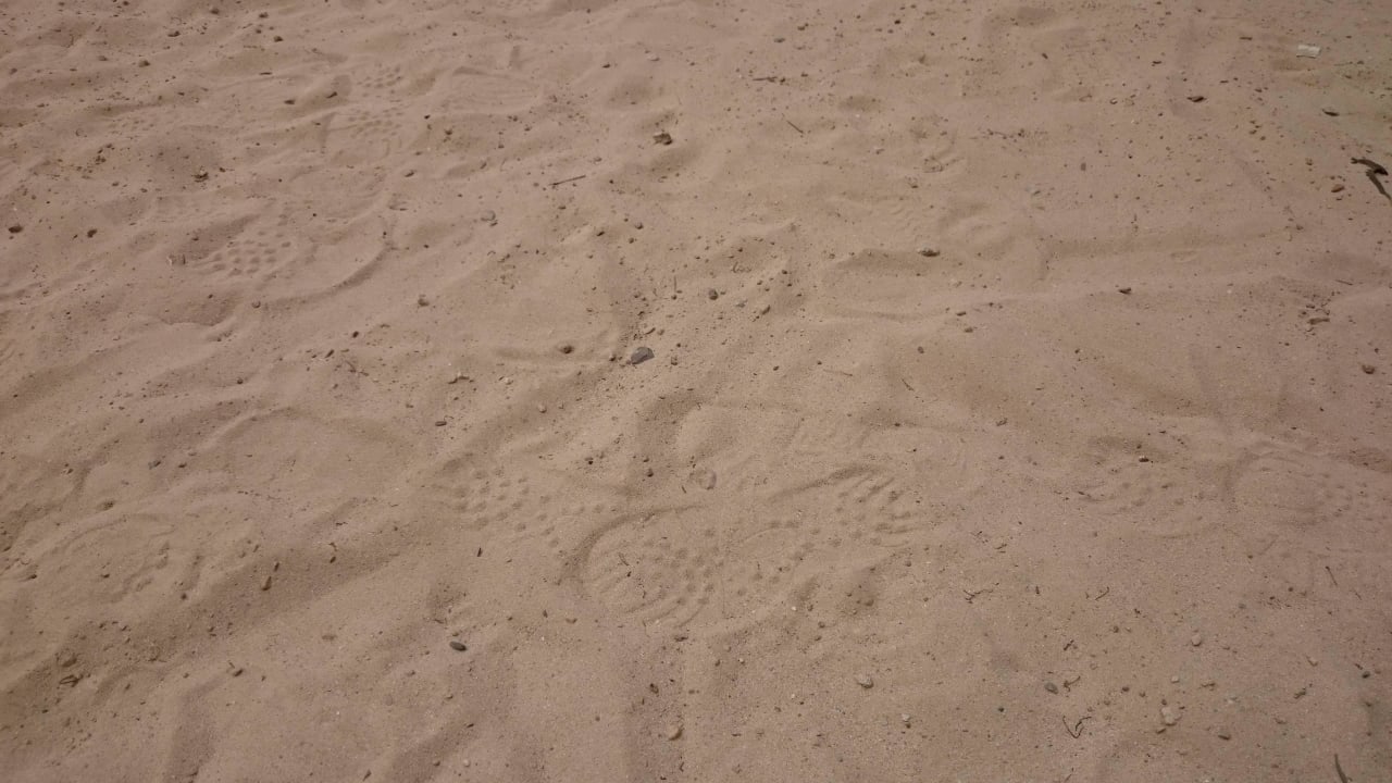 Der durchschnittliche Sand auf dem Spielplatz blau punta reina