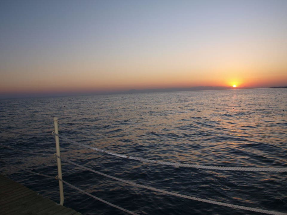 Steg mit Sonnenuntergang Asteria Family Resort Side