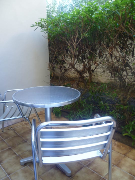 Terrasse mit Blick auf die Mauer Hotel Don Manolito