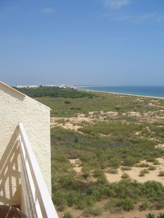 Eine Stunde Strandspaziergang - Monte Gordo Ozadi Altura Beach Resort