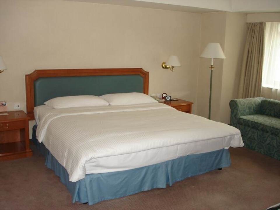 Schlafzimmer von Suite Hotel Jen Shenyang