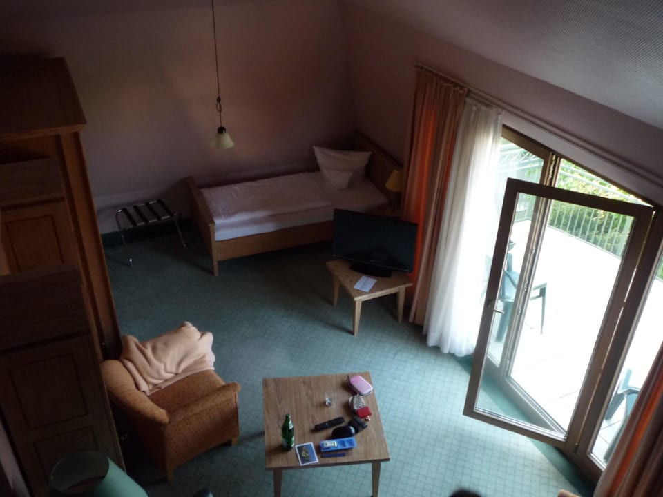 Wohnzimmer vom 3-Bett-Zimmer Weinert's Weinhotel Atrium