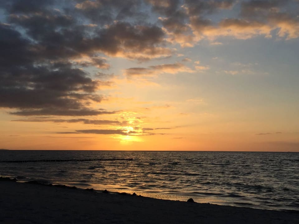 Sonnenuntergang am Strand  Appartementanlage Zur Seemöwe