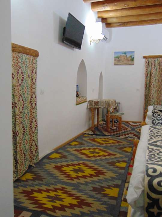 Zimmer Madrasah Polvon-Qori Boutique