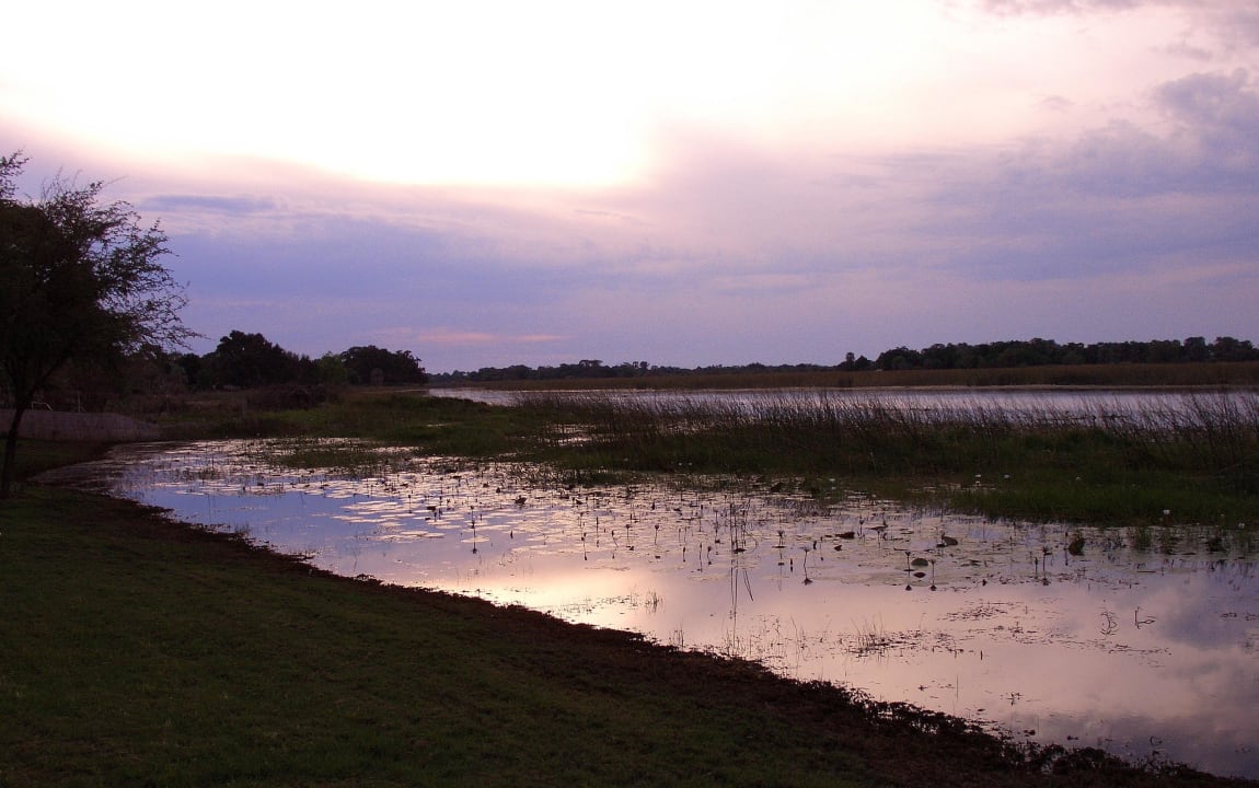 Sonnenuntergang Thamalakane River Lodge