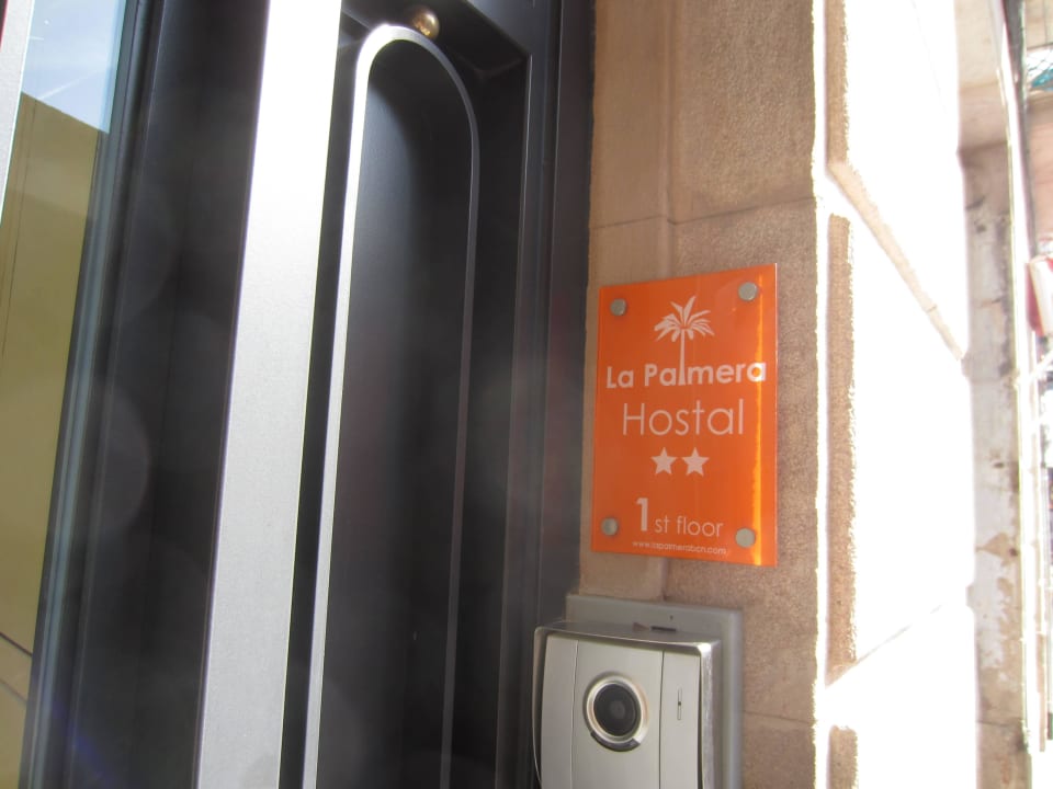 Eingangsschild Hostal La Palmera Barcelona