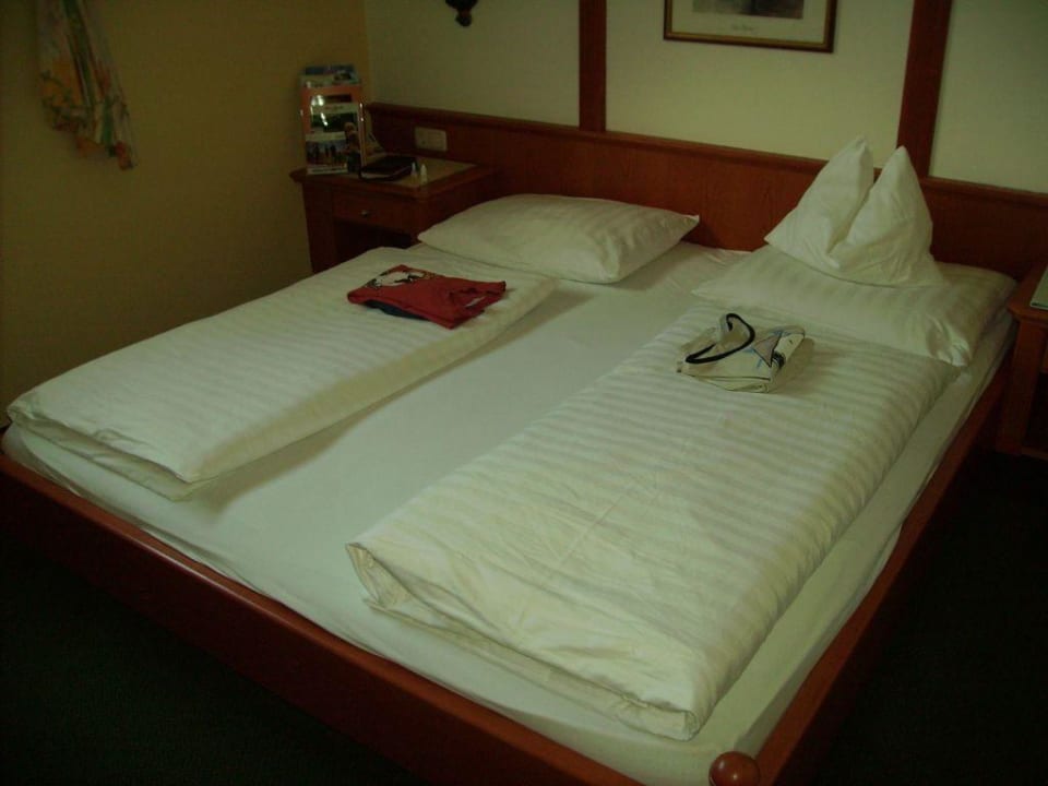 Bett - Zimmer 467 Alpina Alpendorf