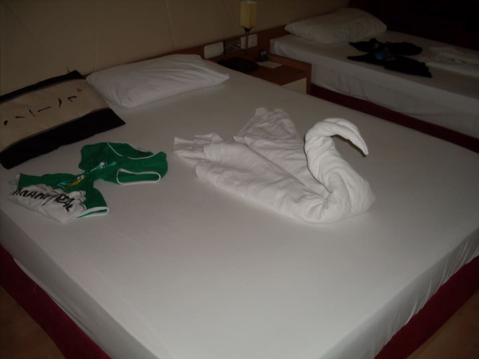 Schön dekoriertes Bett My Home Resort