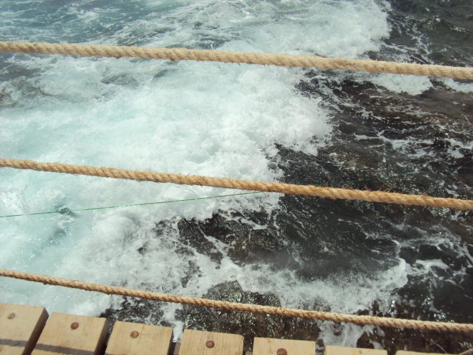 Sonnenuntergang am Strand Three Corners Sea Beach Resort