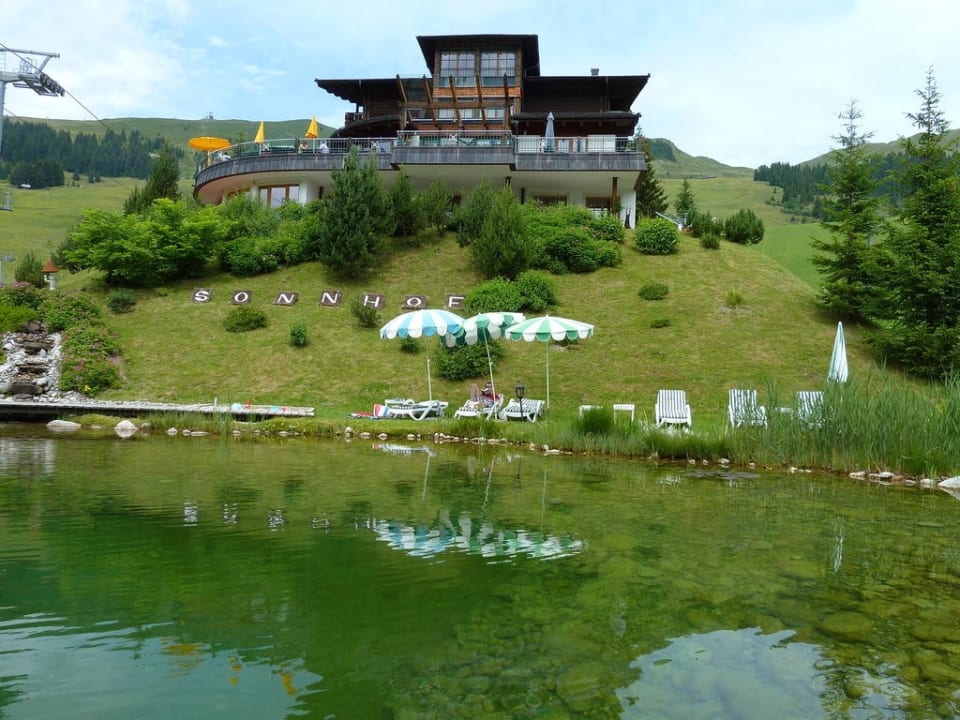 Badeteich mit Hotel Hotel AlpenOase Sonnhof