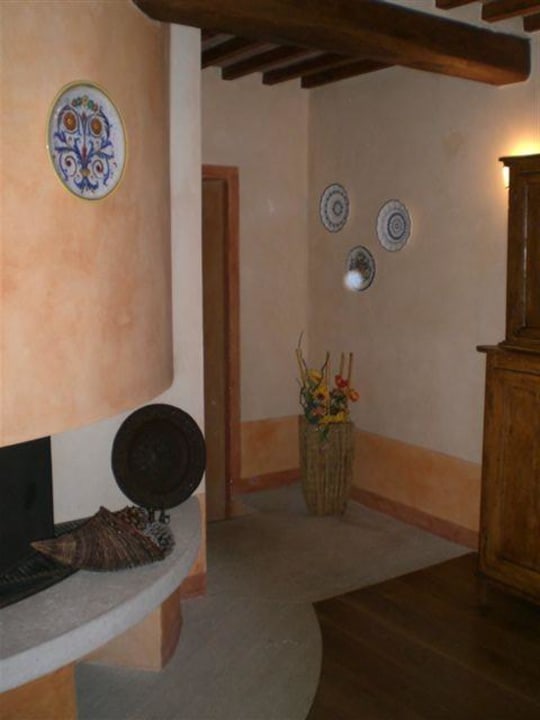 offener Kamin im Esszimmer Hotel La Canonica Di Cortine