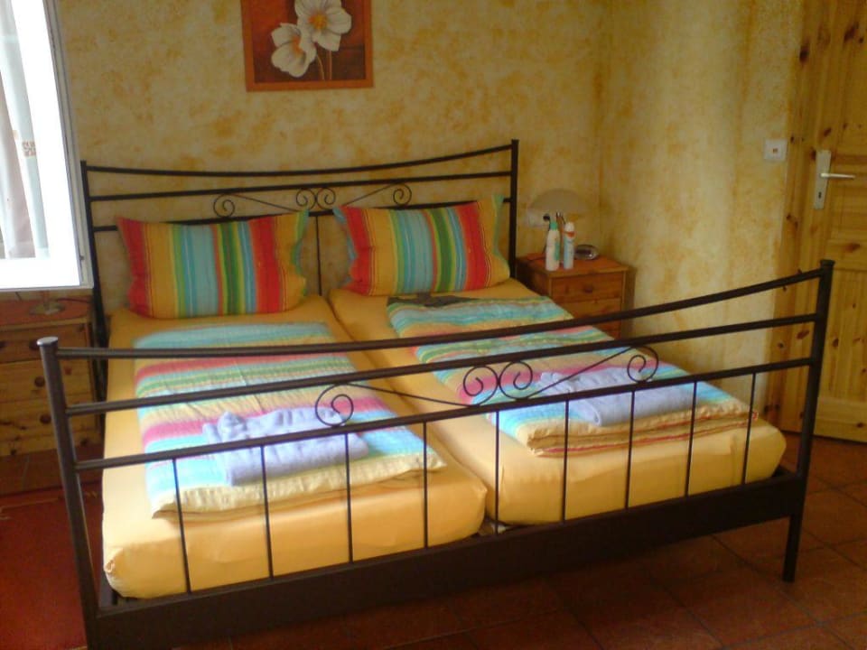 Bett im Doppelzimmer Ferienwohnung Im Mühlengarten