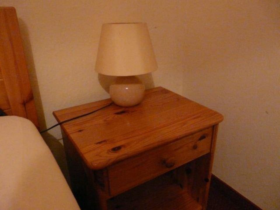 Nightstand and lamp in Berghotel Wilhelmsburg Berghotel Wilhelmsburg