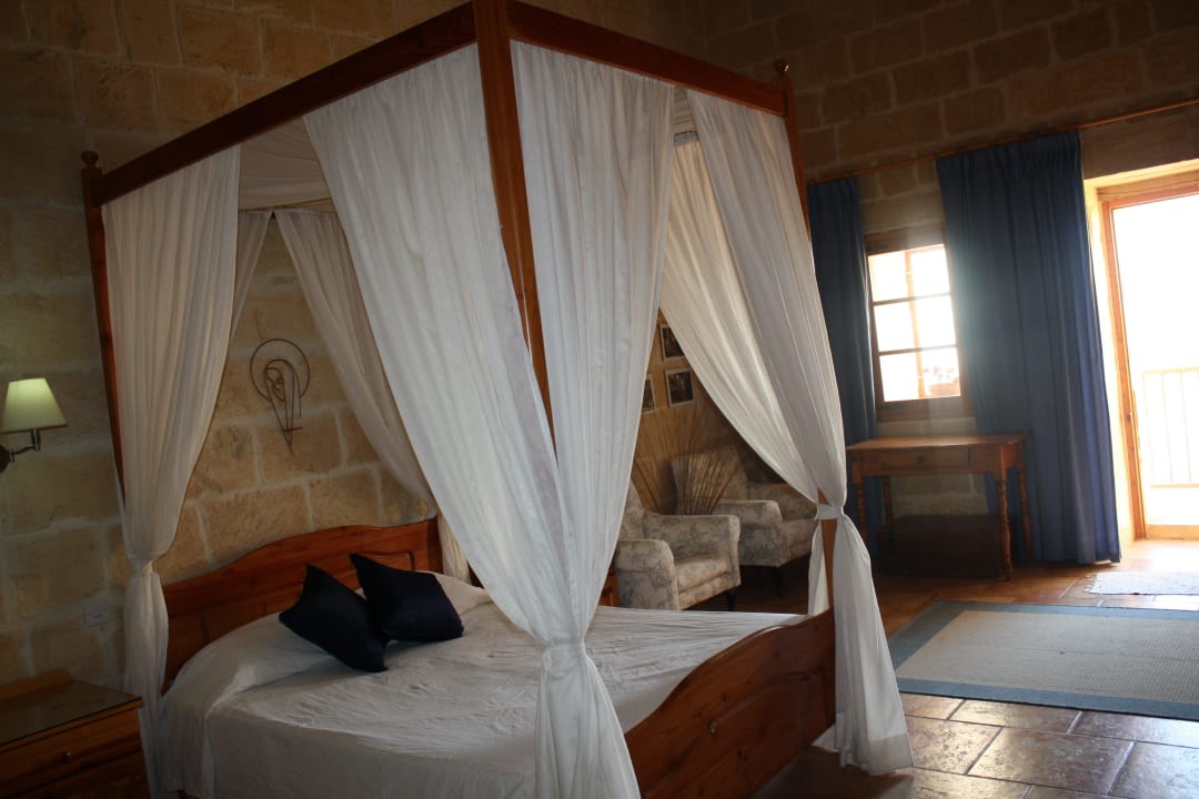Master bedroom with double four-poster bed Ta' Leli Farmhouse