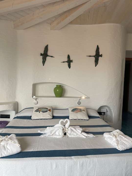 Zimmer Hotel Resort & Spa Baia Caddinas
