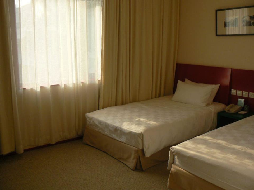 Unser Zimmer Hotel Traveler Inn Hua Qiao Beijing