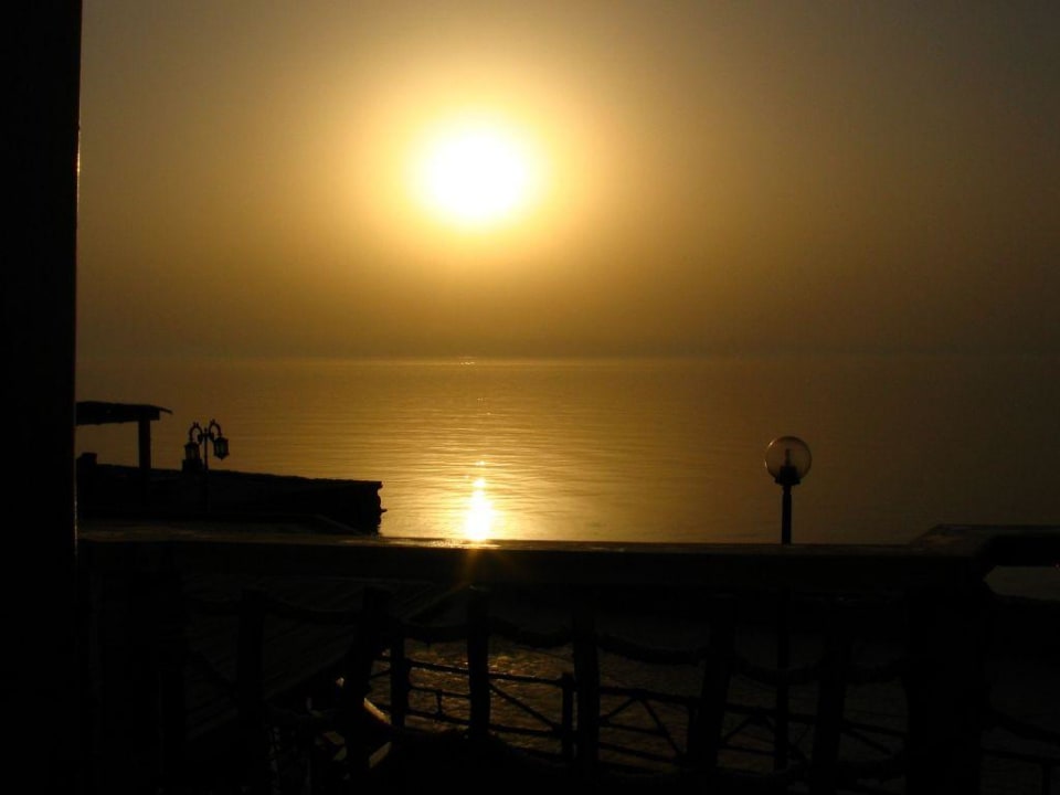 Sonnenaufgang vom Terrassenzimmer aus... Hotel Inmo Divers Home