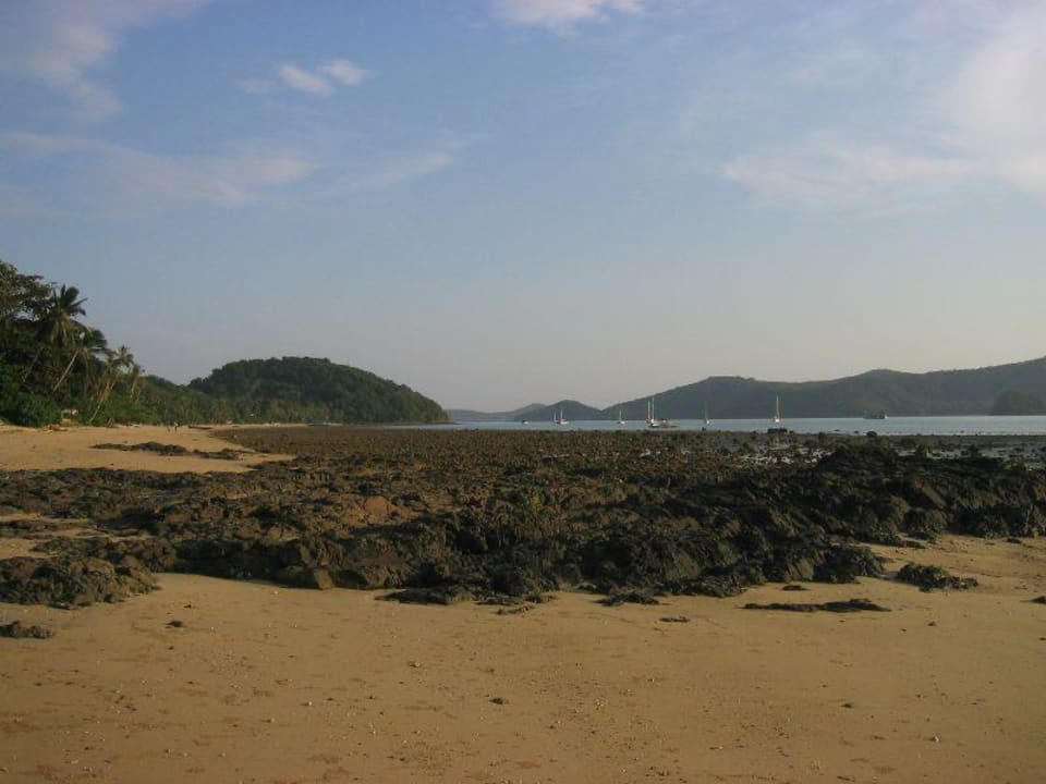 Strand bei Ebbe Hotel By The Sea Residence