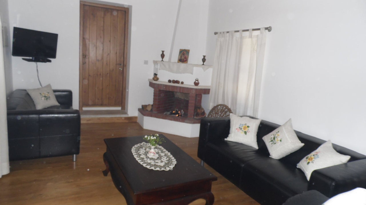 Living area of Suite with Fire Place Guesthouse Arhontiko Frangos
