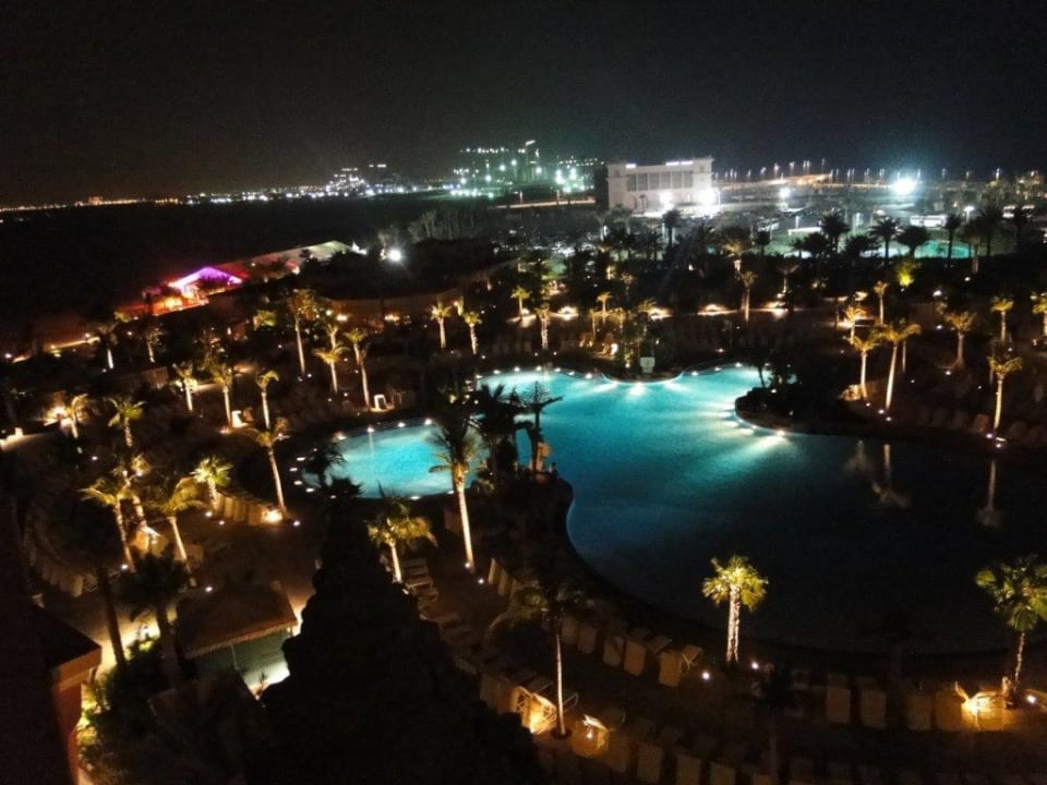 Pool by night Atlantis, The Palm