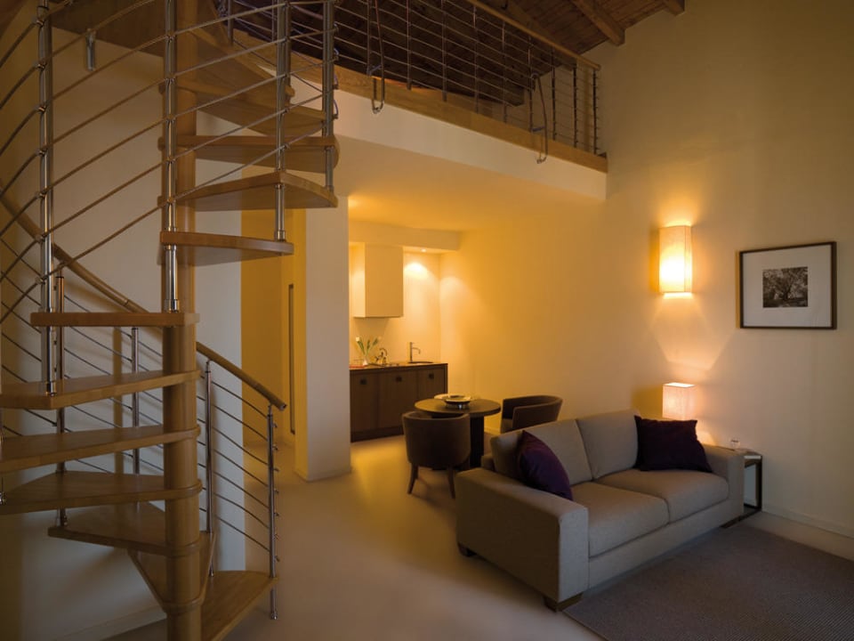 Living room of a suite, all with lake view Novessentia
