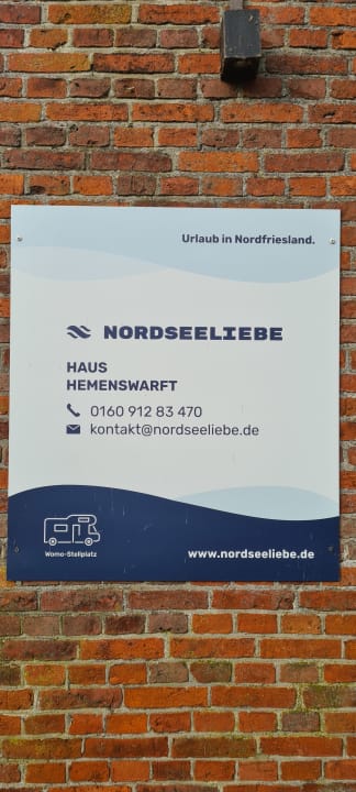 Außenansicht Ferienhaus Hemenswarft direkt an der Nordsee mit Meerblick
