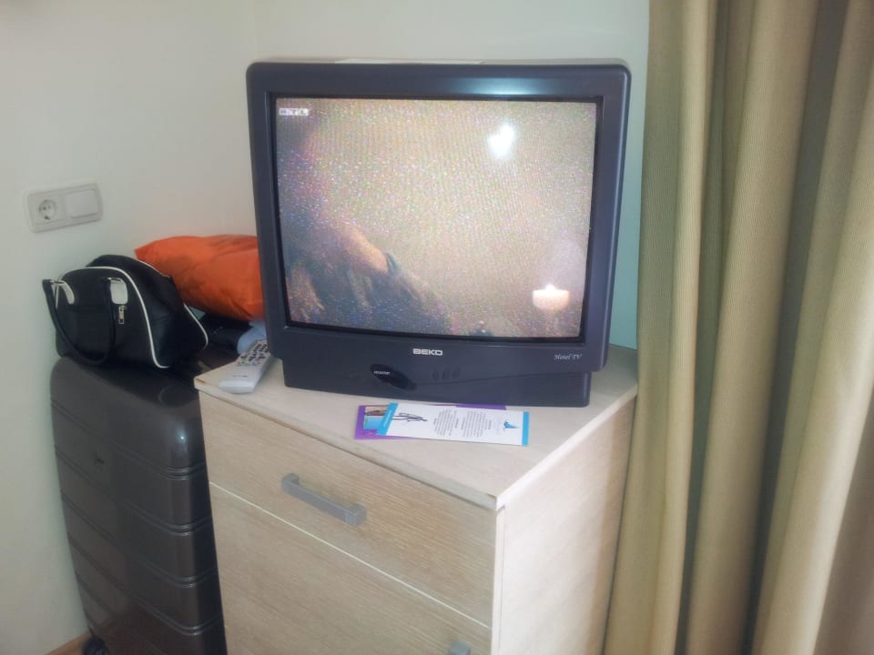 Gestörtes Bild mit Schnee Side Breeze Hotel