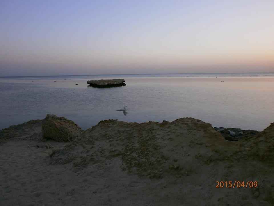 Sonnenaufgang am Strand Pensée Royal Garden Beach Resort