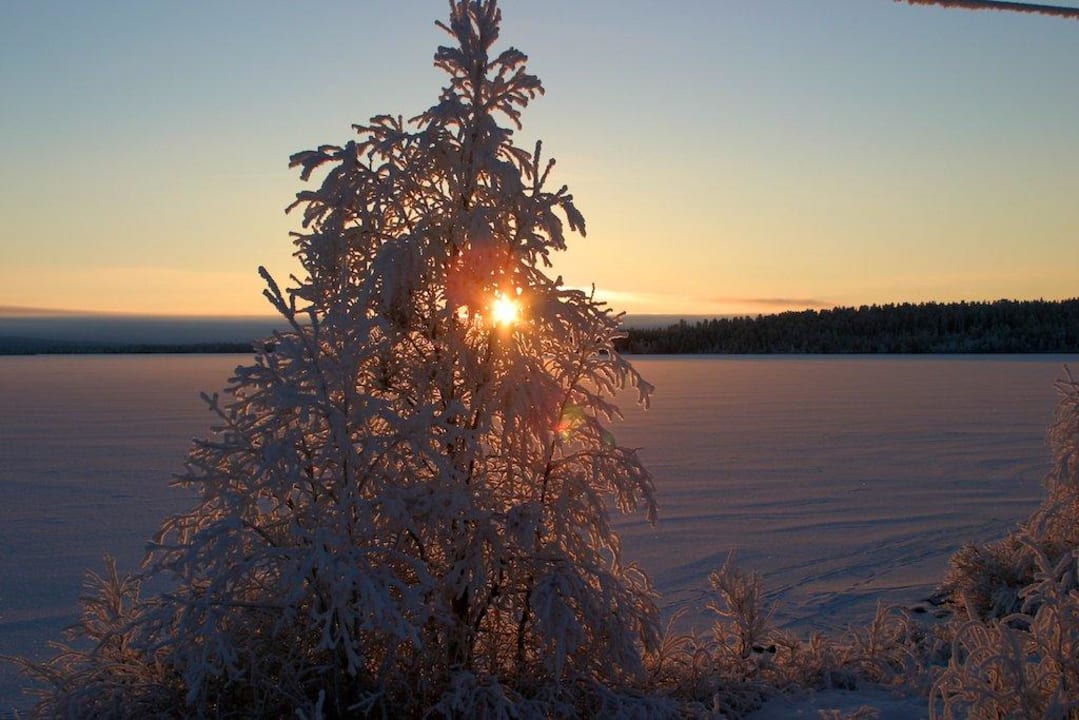 Sonnenuntergang in Lappland Luxus Ferienhäuser Lappland Dream