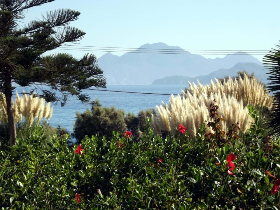 Garten am Pool mit Meer Lagas Aegean Village