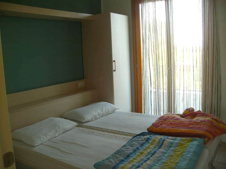 Schlafzimmer Villaggio Amare