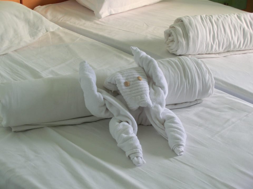 Deko der Betten Paradise Beach Hotel