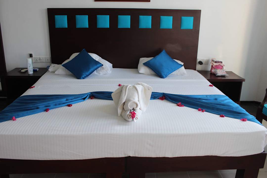 Bett mit Deko Hotel Pigeon Island Beach Resort