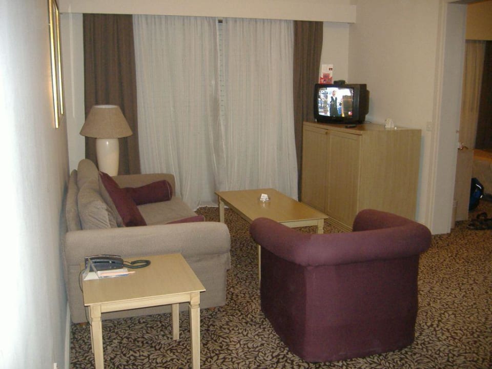 Bequemer Wohnbereich Jasmine Court Hotel and Casino