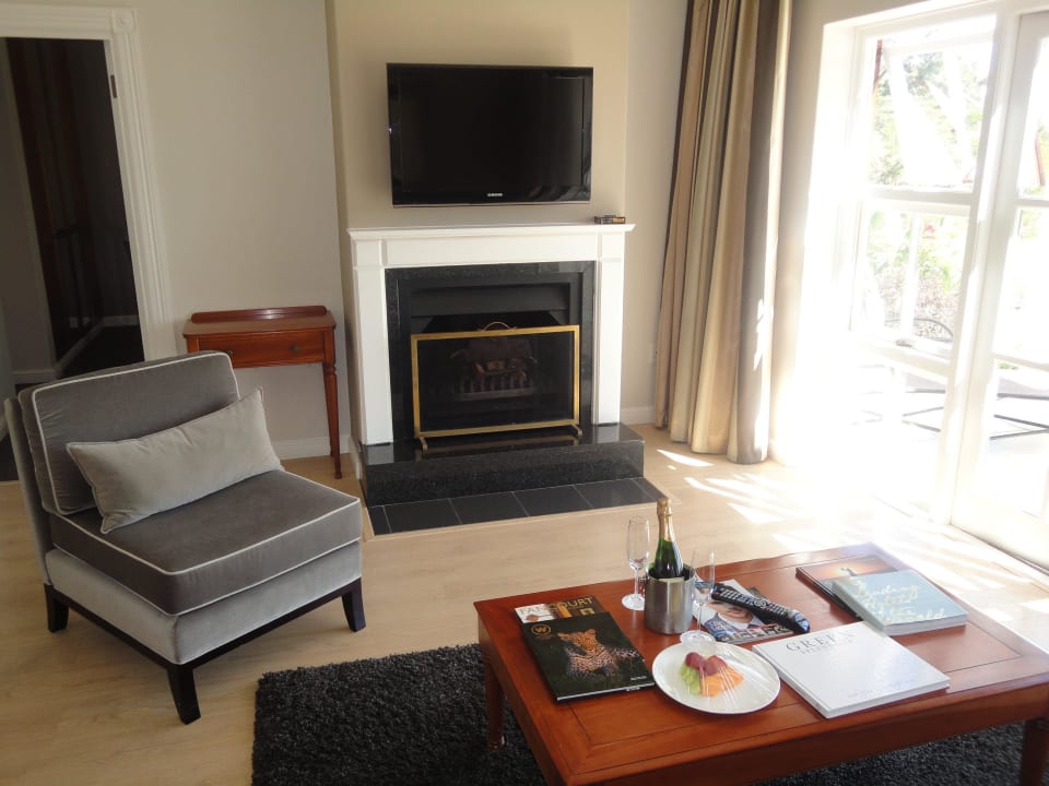 Villa 319 Wohnzimmer mit Kamin Fancourt Hotel