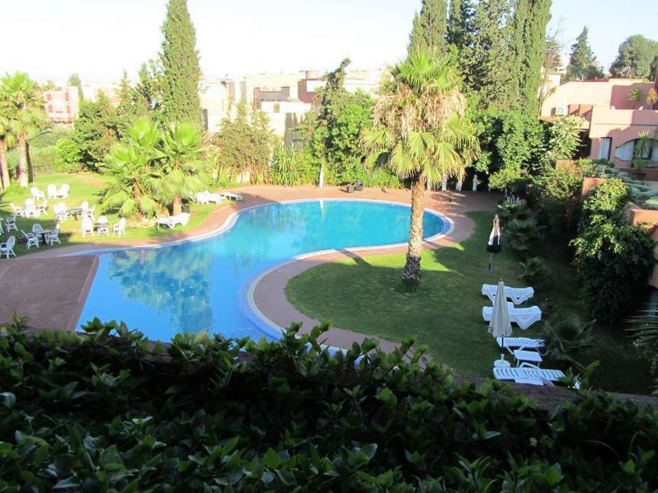 Widok na basen Zaki Suites Hotel & Spa