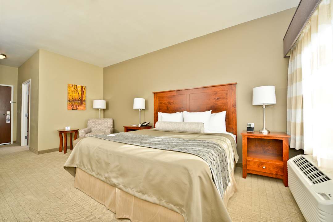 Zimmer Best Western Plus Green Mill Village Hotel & Suites