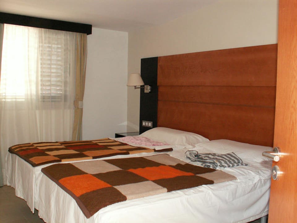 Schlafzimmer HL Miraflor Suites Hotel