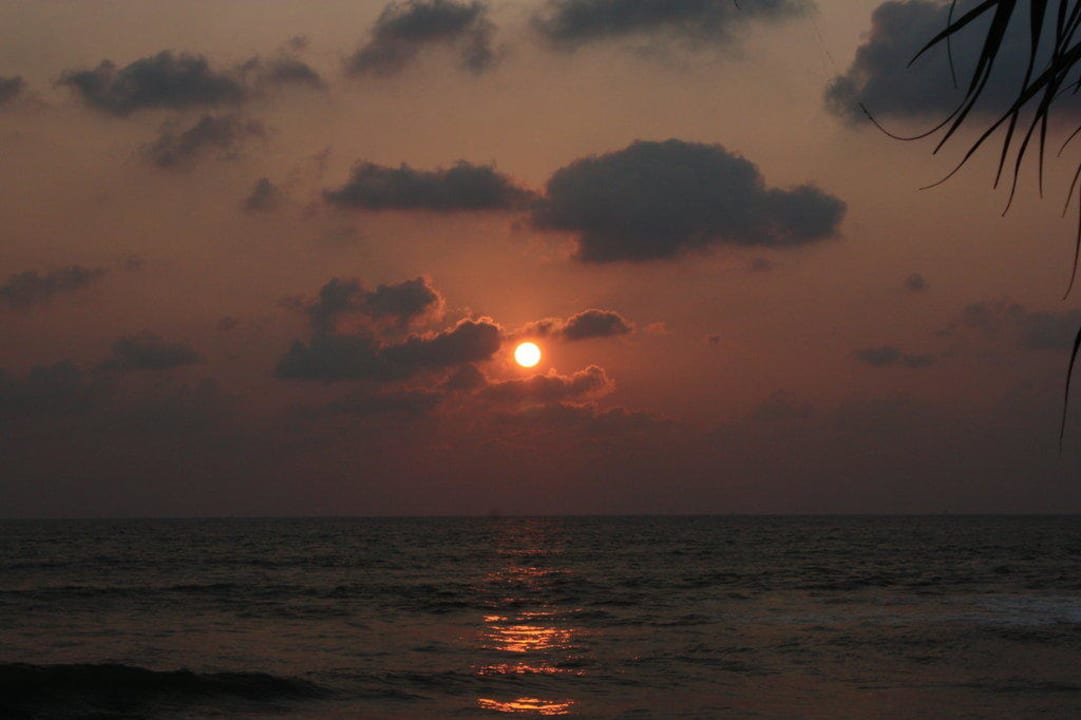 Zachód słońca Royal Palms Beach Hotel