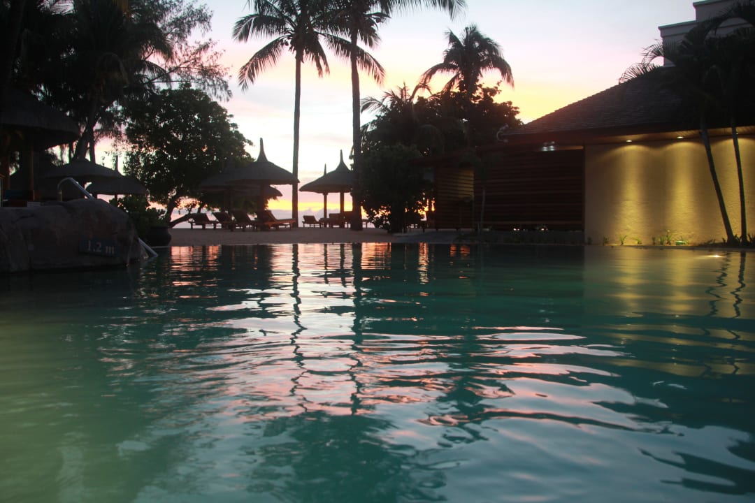 Standing in the pool watching sunset Hilton Mauritius Resort & Spa