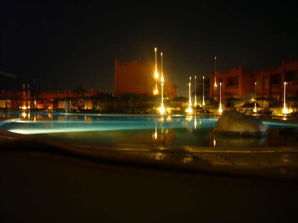 Swimming pool at night Hotel Hauza Beach Resort